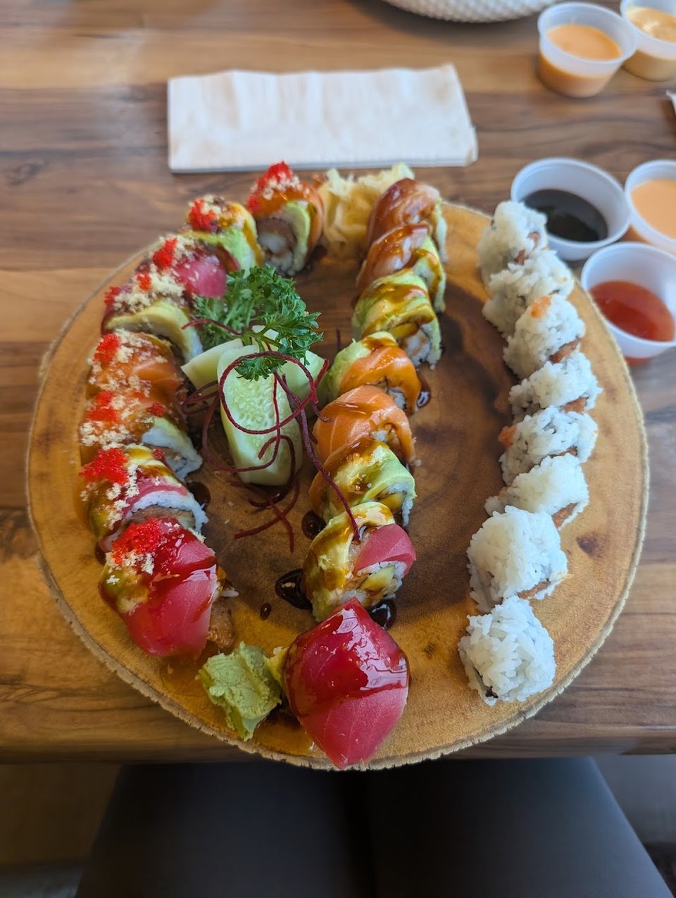 Printed sushi menu with roll choices.