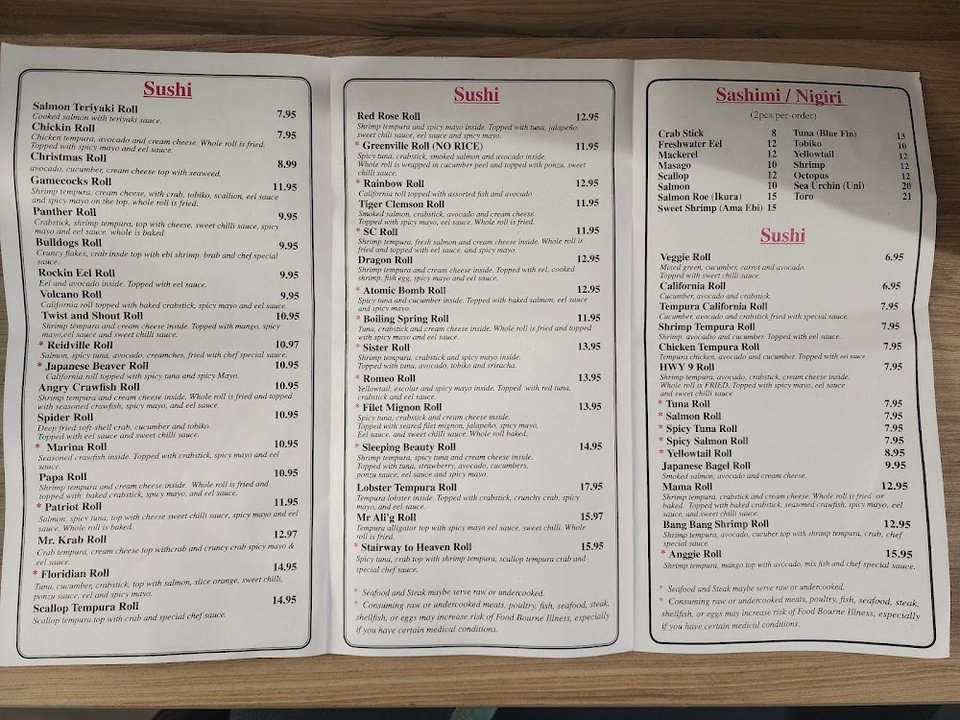 Printed sushi menu with roll choices.